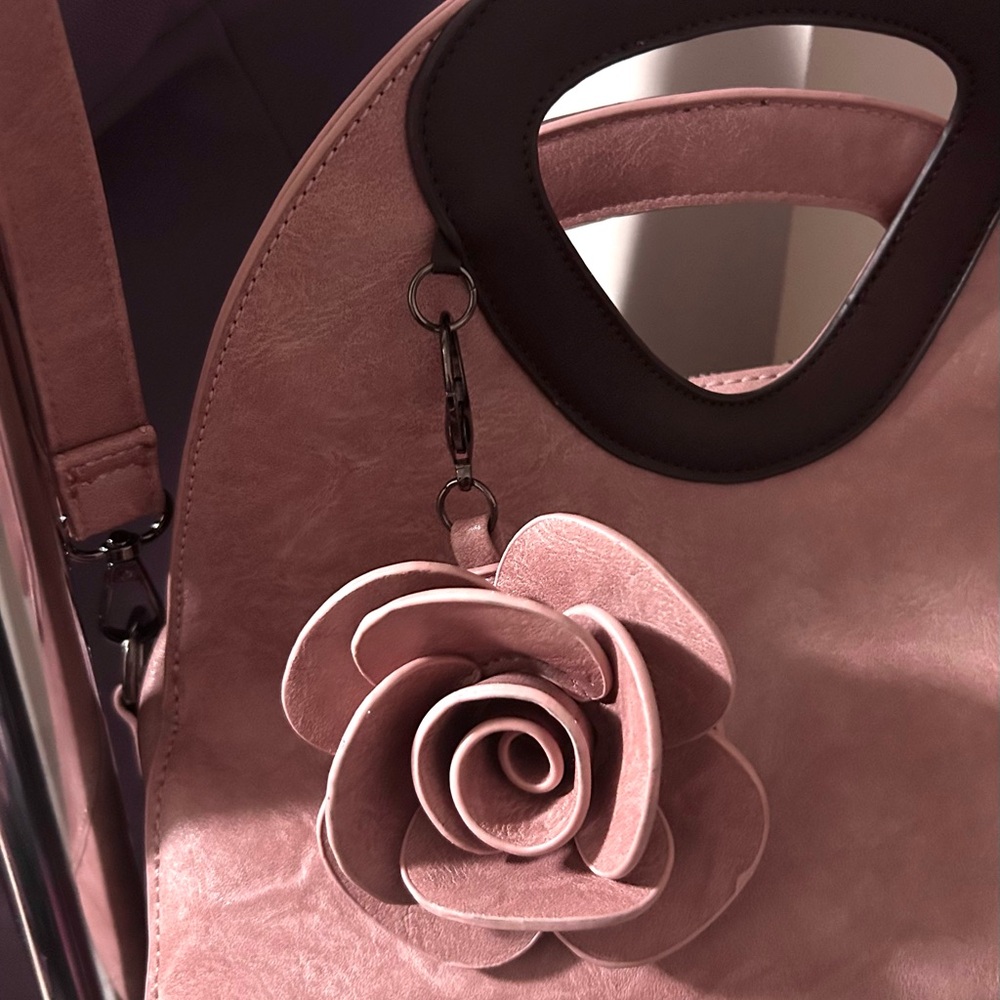Elegant Pastel Pink Distressed Faux Leather Handbag with Floral Accent